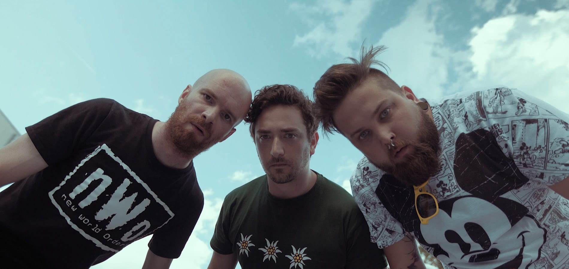 Squareme Stokholm - Three actors (Jan Kok, Jan Hrušovar and Črt Lipnik) looking at the camera from below